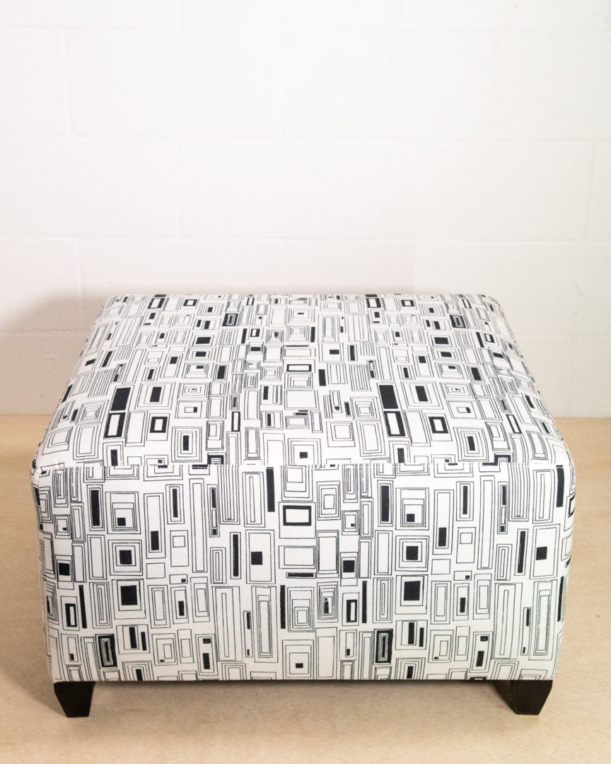 Cristianitos in Clairvoyant Large Ottoman (25" x 27" x 15")