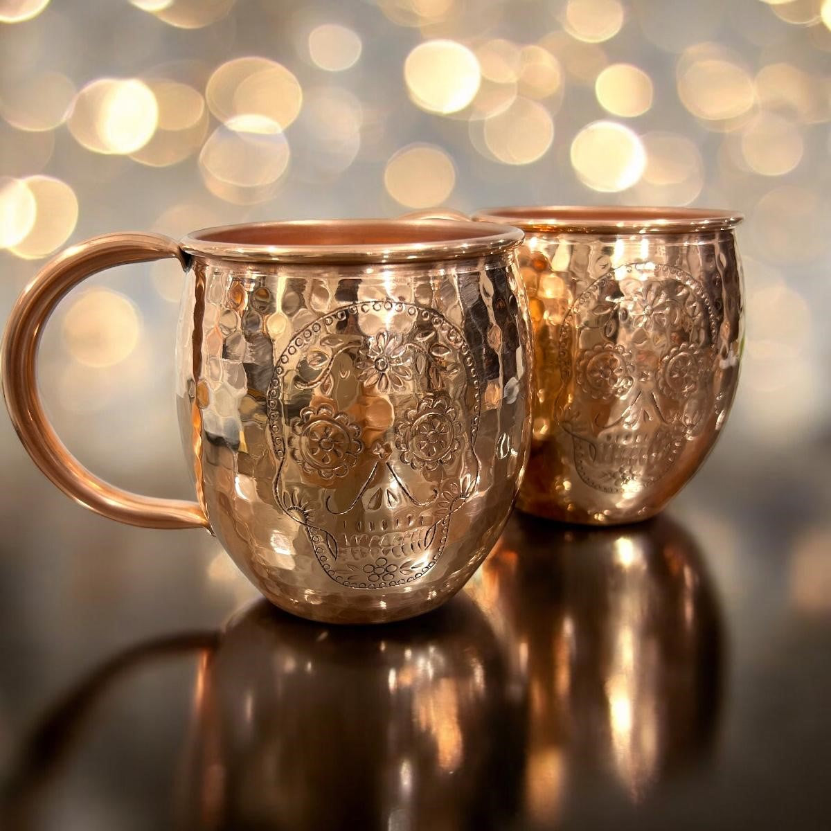 Set of Two Copper Barrel Mugs with Chiselled Skull (Day of the Dead) - Hammered and Shiny Finish